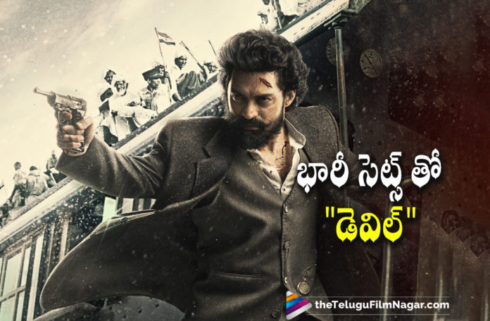 Makers Of Nandamuri Kalyanram Starrer Devil Movie To Make Huge Sets On A Massive Budget,Huge Sets For Devil Movie,Huge Sets For Devil,Huge Sets For Kalyan Ram Devil Movie,Huge Sets For Kalyan Ram Devil,Naveen Medaram,Kalyan Ram And Naveen Medaram Film,Kalyan Ram And Naveen Medaram New Movie,Kalyan Ram And Naveen Medaram Movie,Kalyan Ram And Naveen Medaram Devil,Devil Movie,Devil,Devil Telugu Movie,Devil Movie Updates,Devil Movie Latest Updates,Devil Movie news,Devil Latest Telugu Movie 2021,Devil Kalyan Ram,Kalyan Ram Devil,Kalyan Ram Devil First Look,Kalyan Ram Devil First Look Poster,NKR 21 Movie Title Devil,Kalyan Ram New Movie Devil,Telugu Filmnagar,Latest Telugu Movies 2021,Kalyan Ram Movies,Kalyan Ram New Movie,Kalyan Ram Latest News,Kalyan Ram Latest Movie,Kalyan Ram Upcoming Movie,Kalyan Ram Next Movie,Kalyan Ram Next Projects,Kalyan Ram Latest Movie Updates,NKR 21,NKR 21 Movie,NKR 21 Update,NKR 21 Movie Updates,NKR 21 Movie Latest Update,Devil Movie Sets,Devil Movie Shoot,Devil Movie Shooting Update,Devil Shooting,Devil Movie Huge Sets,Kalyan Ram Devil Movie Shooting
