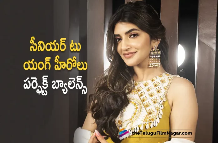 Sreeleela Effortlessly Balancing Young And Senior Heroes, Young And Senior Heroes, Sreeleela Effortlessly Balancing, Dhamaka Collections, Ravi Teja, Sreeleela, Jayaram, Rao Ramesh, Tanikella Bharani, Trinadha Rao Nakkina, Ravi Teja Movies, Ravi Teja Latest Movie, Ravi Teja Upcoming Movie, Dhamaka, Dhamaka 2022, Dhamaka Movie, Dhamaka Update, Dhamaka Latest News, Dhamaka Telugu Movie, Dhamaka Movie Live Updates, Dhamaka Movie Latest News And Updates, Telugu Filmnagar, Telugu Film News 2023, Tollywood Movie Updates, Latest Tollywood Updates